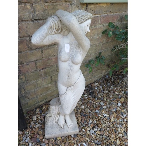 630 - A garden statue of a young lady - Height 85cm