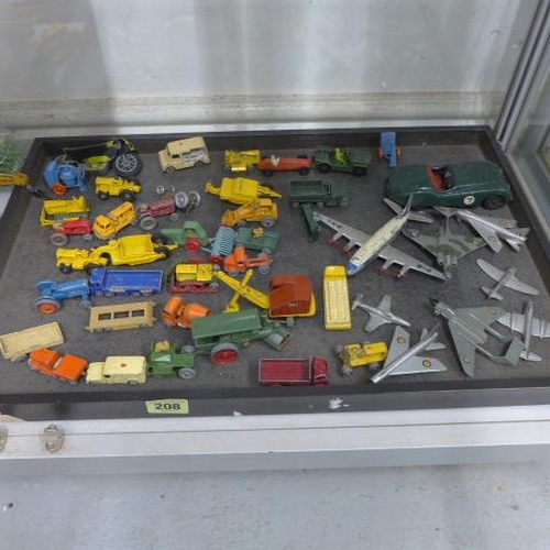 493 - A collection of diecast Lesney vehicles, 8 Dinky Aircraft, a boxed Dinky 956 Fire Engine, other diec... 