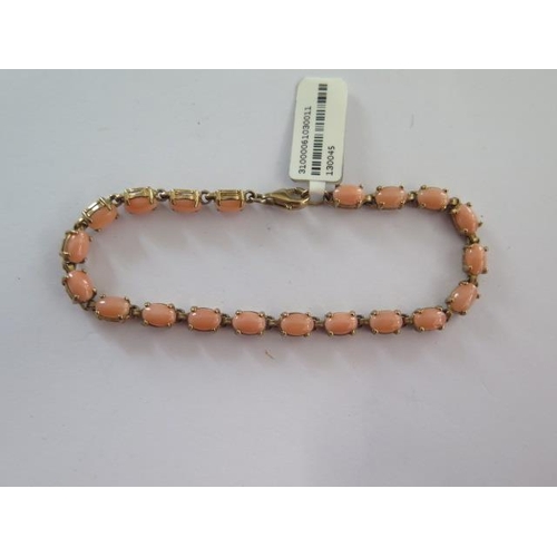 100 - A 9ct yellow gold coral bracelet - approx weight 7.5 grams - RRP £390 - ex jewellers stock