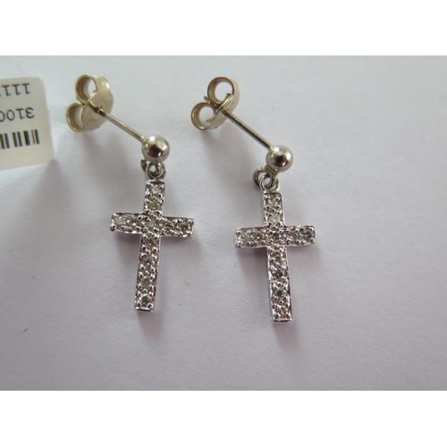 104 - A pair of 18ct white gold diamond cross drop earrings - 2cm long - approx weight 2 grams - RRP £395 ... 