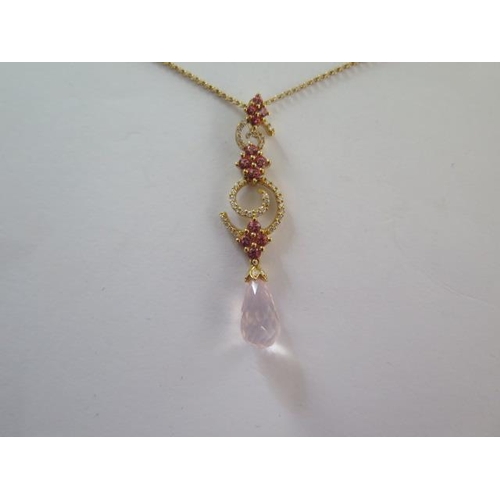 105 - An 18ct yellow gold necklace with pink topaz and rose quartz drop - approx weight 5.6 grams - RRP £4... 