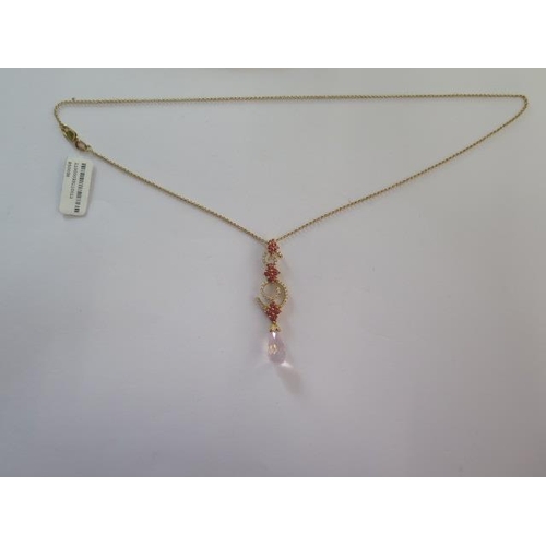 105 - An 18ct yellow gold necklace with pink topaz and rose quartz drop - approx weight 5.6 grams - RRP £4... 