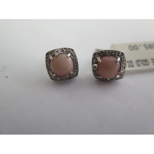 107 - A pair of 9ct white gold coral earrings - approx weight 2.4 grams - 9mm x 9mm - RRP £395 - ex jewell... 