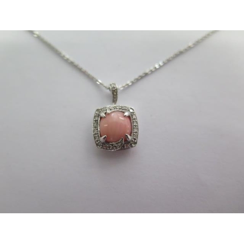 108 - A 9ct white gold coral pendant - matching previous lot - approx weight 3 grams - RRP £340 - ex jewel... 