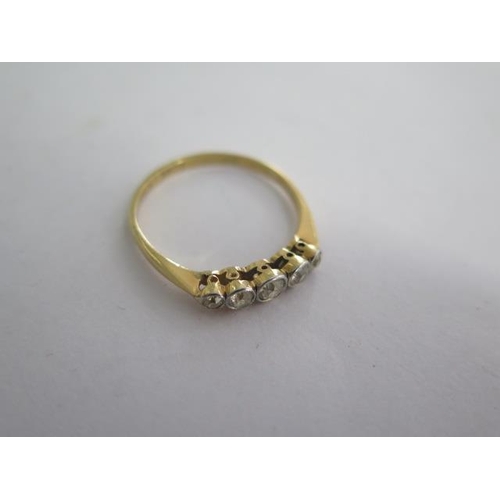11 - An 18ct yellow gold and platinum five stone diamond ring size S - approx weight 2.4 grams - diamonds... 