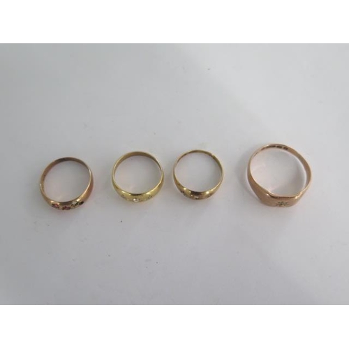 12 - Four 9ct yellow gold rings, stones missing to two - total weight approx 12.2 grams