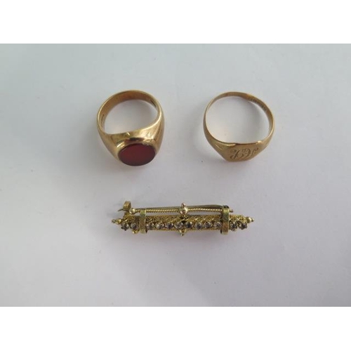 127 - Two 9ct yellow gold signet rings sizes L and R and a 9ct brooch - total weight approx 11.5 grams