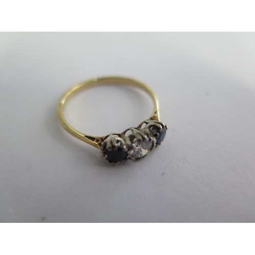 131 - A yellow gold diamond and sapphire three stone ring size S/T - approx weight 2.6 grams - surface tes... 