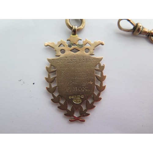 135 - A 9ct yellow gold watch chain with a 9ct medallion fob - Length 34cm - approx weight 35 grams - each... 