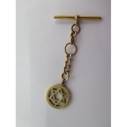 136 - An 18ct yellow gold Star of David pendant/fob on a short 18ct chain - Length 8cm - approx weight 15.... 