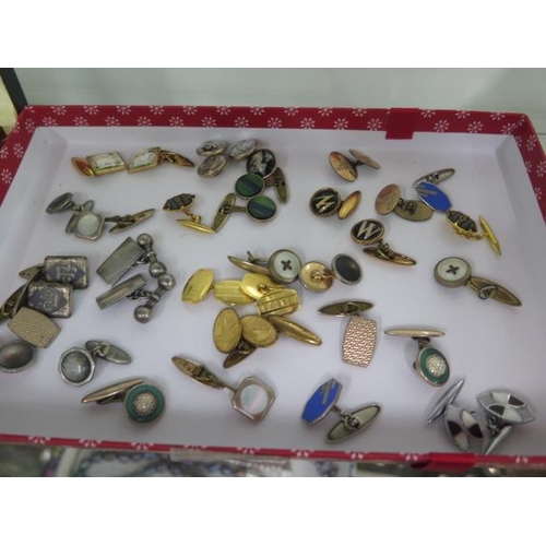 189 - A large collection of cufflinks and tie bars