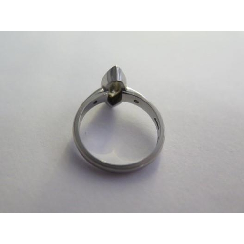 19 - A handmade platinum diamond ring with a central Marquise cut light champagne diamond - approx 0.94ct... 