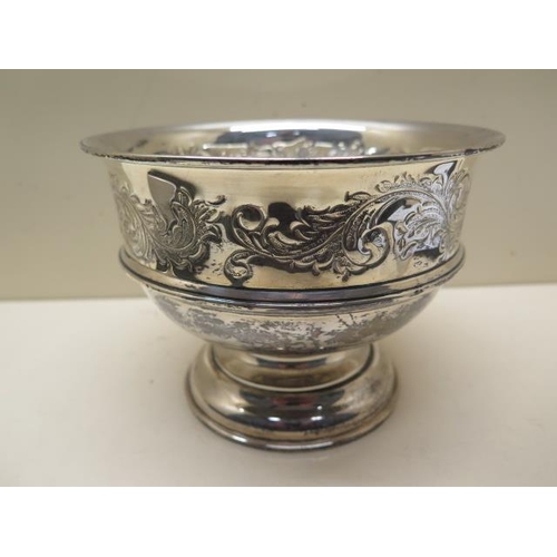 201 - A silver embossed footed bowl Birmingham 1929/30 - no engraving - Height 13cm - approx weight 11.8 t... 