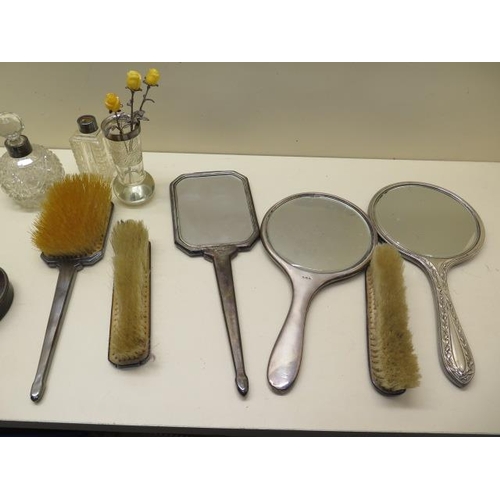 208 - Six silver and tortoiseshell backed dressing table mirrors and brushes, a box and three silver rim b... 