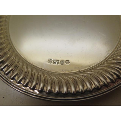 211 - A silver presentation pierced dish - diameter 20cm - and a silver coaster - total weight approx 10.6... 