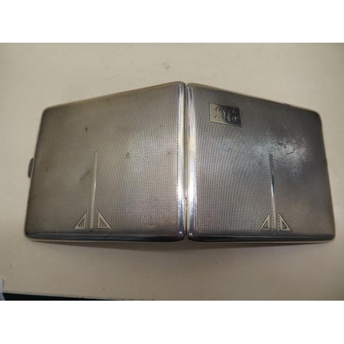 214 - A silver cigarette case - approx weight 4.2 troy oz - 9.5cm x 8cm