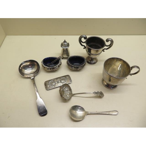 232 - A pair of silver salts, a silver pepper, silver cup, small silver tankard - engraved, two spoons, a ... 