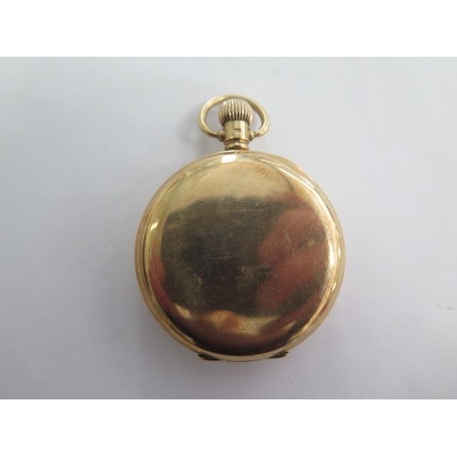 257 - A 9ct yellow gold open face top wind pocket watch - 50mm case - approx weight 86 grams - running wit... 