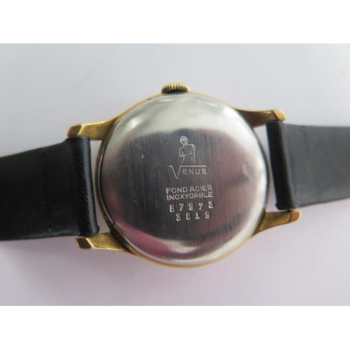 281 - A Venus manual wind gents date moon roller wristwatch - 35mm case - on a leather strap - case no 879... 