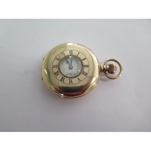 285 - A 9ct yellow gold top wind half hunter pocket watch - 50mm case - approx weight 97 grams - generally... 