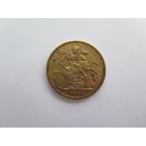 304 - A Victorian gold full sovereign coin dated 1891