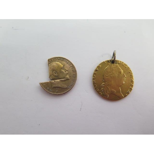 322 - A George III gold Guinea coin dated 1798 with ring mount and a part gold sovereign coin dated 1916 -... 