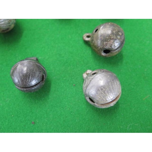 363 - A collection of 15 rumble bells - largest 34mm wide