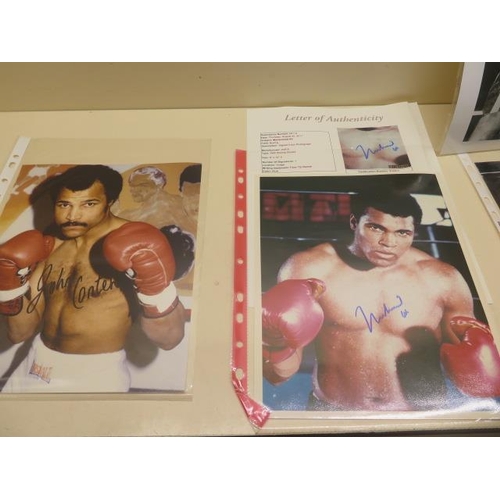 366 - A collection of seven boxing autographed photos including Mohammed Ali, Joe Bugner, Henry Cooper