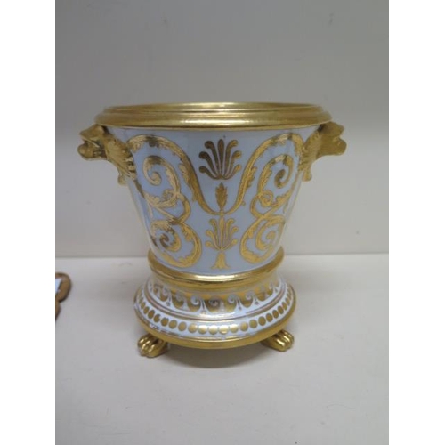 398 - A 19th century gilt decorated planter and base - Height 17cm - some chipping and wear but reasonably... 