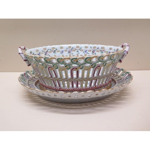 399 - A French porcelain Amorial basket on stand - Height 10cm x Width 25cm - both in good condition