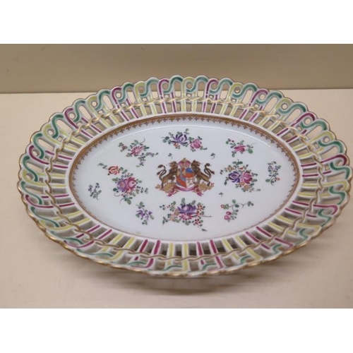 399 - A French porcelain Amorial basket on stand - Height 10cm x Width 25cm - both in good condition