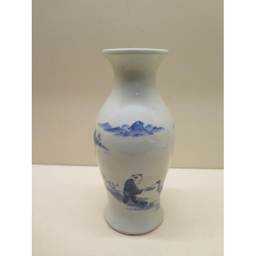 401 - A heavy blue and white oriental design vase - Height 21cm - generally good