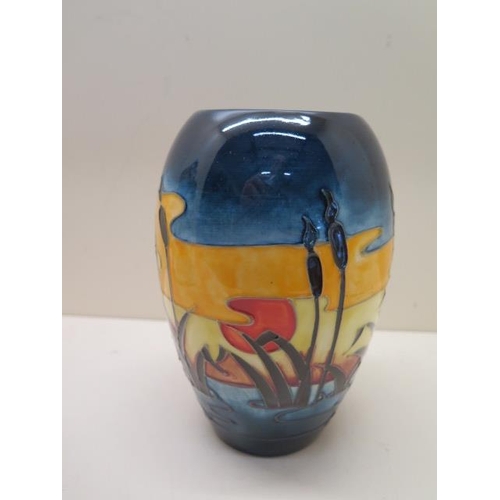 412 - A Moorcroft Bullrush vase - Height 19cm - some crazing to base otherwise good