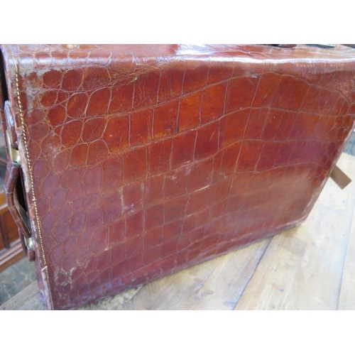 425 - An Edwardian crocodile leather gentleman's vanity case , trunk, by Mappin and Webb , the hinged lid ... 