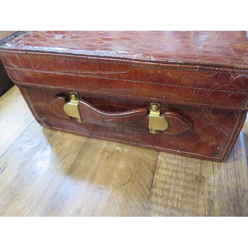 425 - An Edwardian crocodile leather gentleman's vanity case , trunk, by Mappin and Webb , the hinged lid ... 