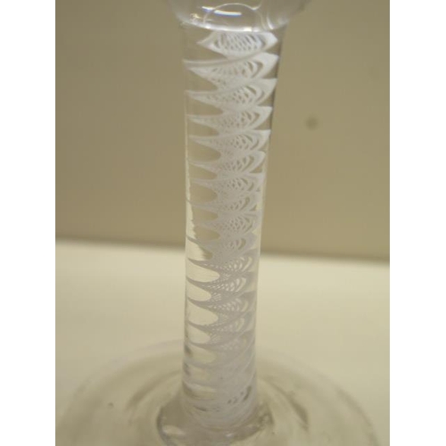 430 - An 18th century spiral twist cordial glass with a bell shaped etched bowl - Height 17cm - good condi... 