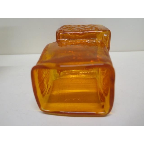 444 - A Whitefriars glass orange/tangerine drunken bricklayer vase - Height 21cm