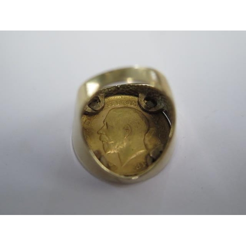 46 - A 9ct gold full sovereign ring George V dated 1912 ring size P - approx weight 15.5 grams