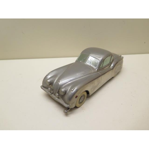 487 - A clockwork Prameta Kolner Automodelle Jaguar XK120 - no key and four Dinky and Corgi vehicles