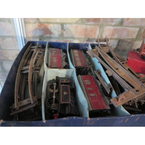 490 - Hornby O Gauge tinplate part boxed train set, three boxed wagons, two boxed signals and a water towe... 