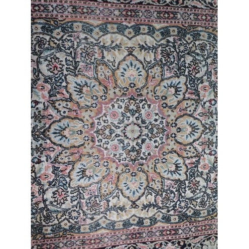 565 - A silk pile rug with a cream field and stylized boarder - 200cm x 120cm - some slight wear but reaso... 