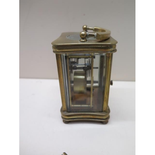 581 - A brass carriage clock - Height 13cm - running with key