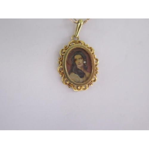 6 - An 18ct portrait pendant on a 9ct 50cm chain - total weight approx 6.3 grams