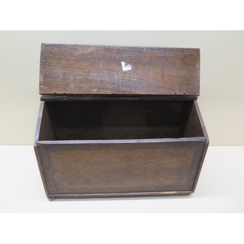 604 - An oak candle box - Height 28cm x 32cm x 16cm