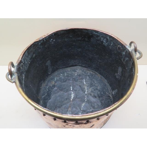 606 - A riveted copper log bucket - Height 24cm x Width 35cm