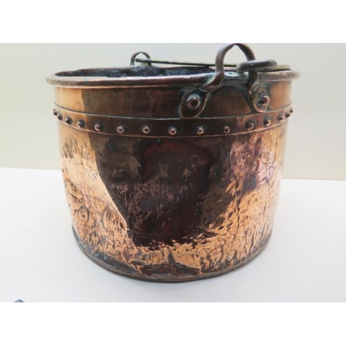 606 - A riveted copper log bucket - Height 24cm x Width 35cm