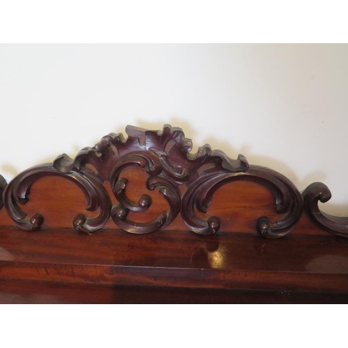 619 - An impressive early 19th century mahogany twin pedestal sideboard with two cupboards and three cushi... 