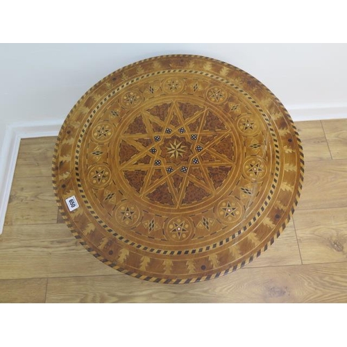 650 - A Moroccan round inlaid timber coffee table - Height 43cm x Diameter 61cm