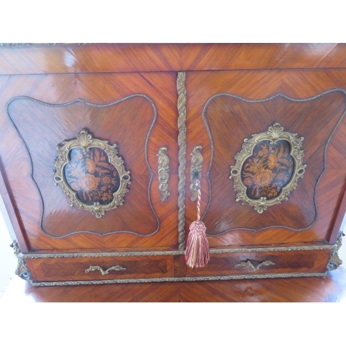 651 - A good 19th Century kingwood, rosewood and ormolu mounted Bonheur du Jour with cavetto top, enclosed... 