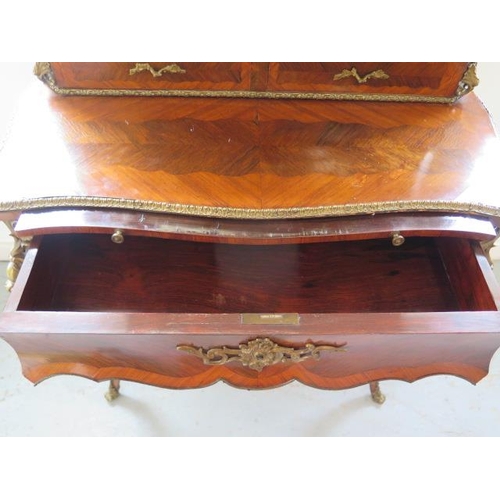 651 - A good 19th Century kingwood, rosewood and ormolu mounted Bonheur du Jour with cavetto top, enclosed... 